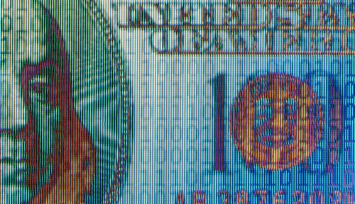 Image shows a pixelated $100 dollar bill, representing digital money.