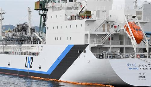 A rear view of a large tanker ship in port in Kobe, Japan, in 2020.